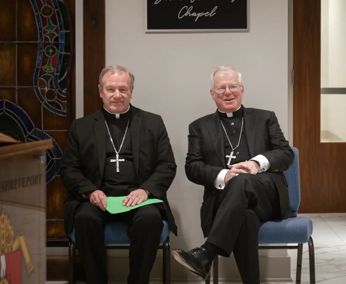 Bishops Marshall Malone Bishop Robert Marshall, Apostolic Administrator and Bishop Emeritus Francis Malone of the Diocese of Shreveport, seated at a press conference announce Bishop Malone's retirement and Bishop Marshall's appointment.